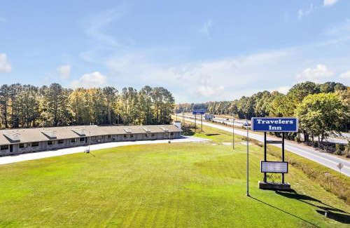 Four Oaks Hotel | TRAVELER'S INN