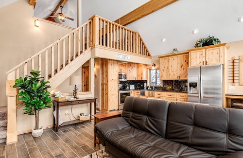 Nekoosa House | Tree-surrounded cabin with lake views, kayaks, wood-burning fireplace, & W/D