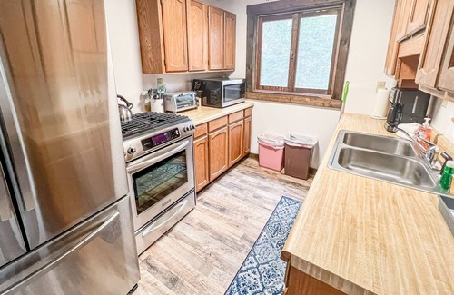 Wardsboro House | Tree-surrounded home with wood stove, spacious deck, gas grill - close to trails