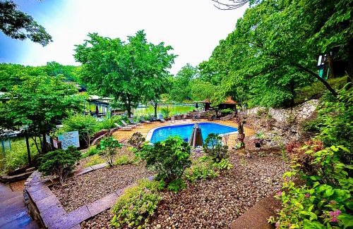 Village of Four Seasons House | Treetop 3bd3badeckpoolsgrilldock-sleeps 8pp