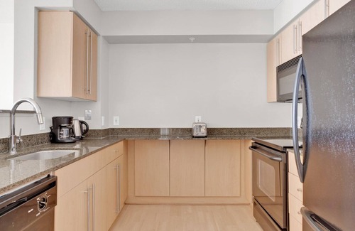Woodmont Triangle Apartment | Trendy Bethesda 1BR w/Gym, Pool & Concierge, near Metro, by Blueground