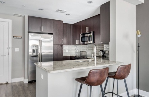 Woodmont Triangle Apartment | Trendy Bethesda 1BR w/W/D, Gym & Roof, nr dining, by Blueground