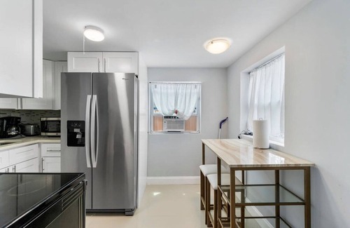 Dolphin Isles Apartment | Trendy Modern Haven, Just Steps from the Sea