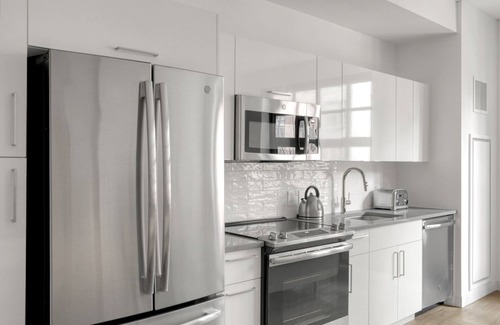South of Washington Apartment | Trendy South End Studio w/W/D & Gym, near SoWa District, by Blueground