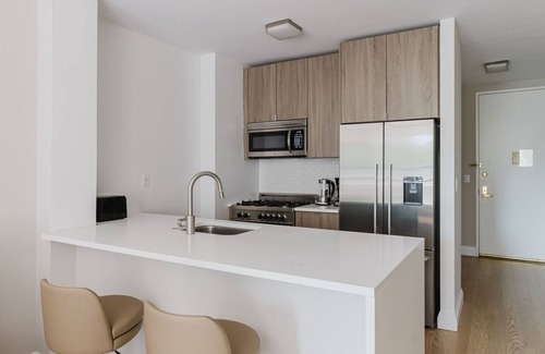 Upper East Side Apartment | Trendy UES Studio w/Doorman, Gym, Lounge & W/D, by Blueground