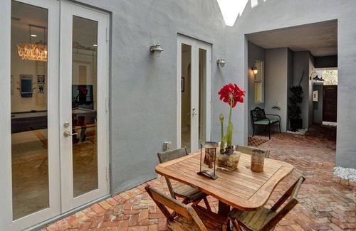 Sailboat Bend House | Tropical Fun Downtown! Spacious, courtyard, sweet pool, game room, walkable area