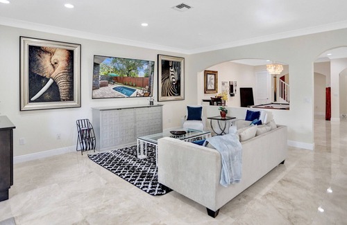 Sailboat Bend House | Tropical Fun Downtown! Spacious, courtyard, sweet pool, game room, walkable area