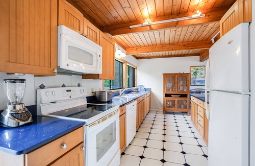 Kilauea House | Tropical home across from Anini Beach with amazing deck & small ocean view