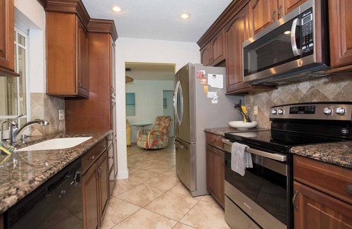 Punta Gorda House | Tropical island style pool home