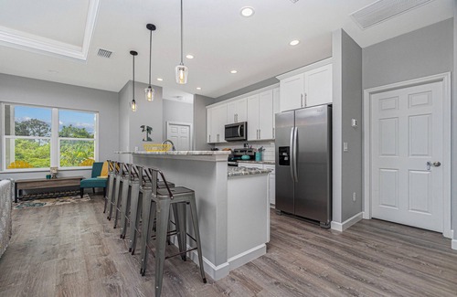 Englewood East House | Tropical Oasis with saltwater pool & hot tub on a canal 8 miles from beaches