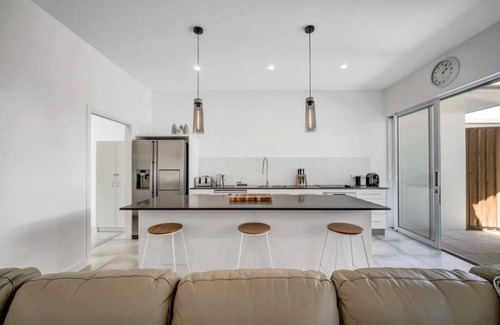 Port Douglas House | Tropical Private Oasis with heated pool just a short walk away from 4 mile beach