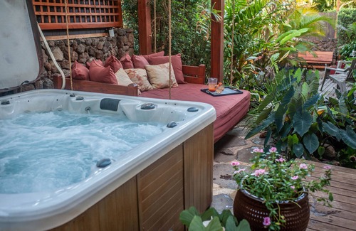 Bayview Condo | Tropical Rendezvous Suite - Luxury Studio in tropical gardens with koi ponds.