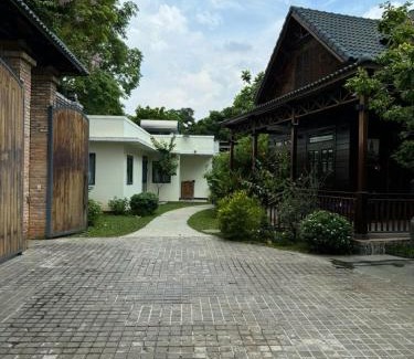 District 9 Villa | Tropical Riverfront Pool House