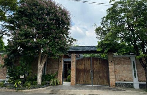 District 9 Villa | Tropical Riverfront Pool House