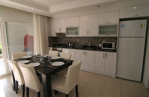 Kemer Mahallesi Apartment | Tropicana G 2 three bed ground floor home in popular gated community
