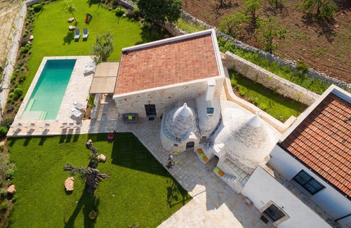 Castellana Grotte Villa | Trulli L'Aia di Cucumo: luxury complex with trulli