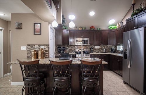 Sunrise Manor House | Tuscan Oasis: Elegance with Comfort. King bed.