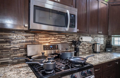 Sunrise Manor House | Tuscan Oasis: Elegance with Comfort. King bed.