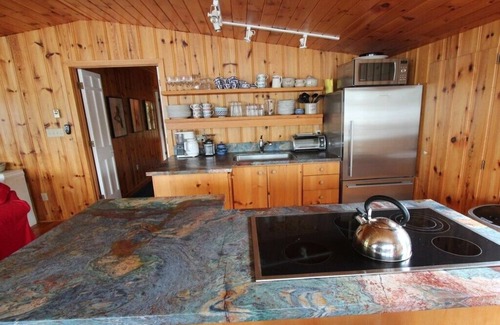 Seguin Cottage | Two bedroom + 1 bedroom Boathouses on beautiful north Lake Joseph