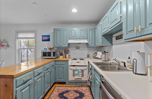 Newport Apartment | Two-bedroom, two bath vacation rental in Newport w/parking. Blocks from water