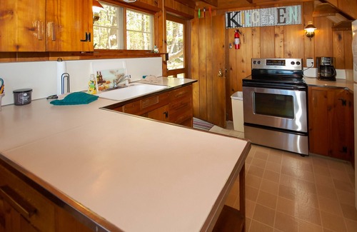 Maple City Cottage | Two classic lakefront cottages with a dock - washer/dryer, firepit, water views