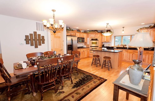 Eagle River House | Two duplex townhomes w/fireplaces, outdoor spaces, & shared boat launch/marina