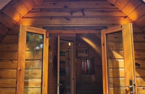 Mill Spring Apartment | Two person Pod on the creek, Deck, private firepit, full bathroom, Kitchenette, Sleeps 2.