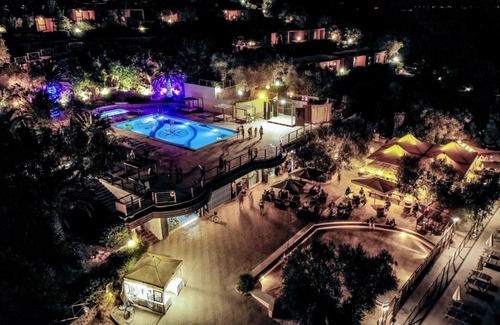 Talamone Apartment | Two-room brick apartment of approximately 35 m2 equipped with air conditioning surrounded by vegetation, composed of a living room with flat-screen television, two single beds and a kitchenette equipped with stove, fridge with freezerA double bedroom, ba