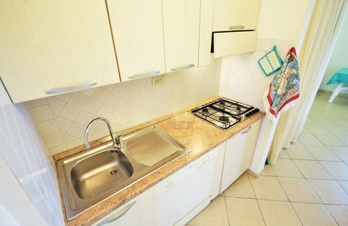 Golfo di Marinella Apartment | Two-room ground floor 100 meters from the beach and establishment with restaurant bar