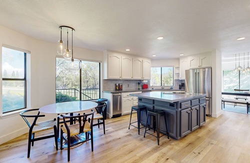Groveland House | Two-story golf course-adjacent getaway with a patio, washer/dryer, central AC