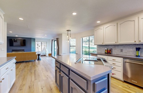 Groveland House | Two-story golf course-adjacent getaway with a patio, washer/dryer, central AC