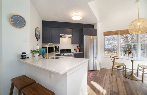 Manistee Condo | Two Story HV Condo with Water Views