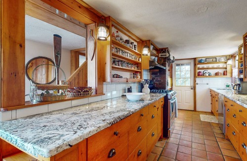 Newbury House | Two-story riverfront retreat with a furnished deck, views, & washer/dryer