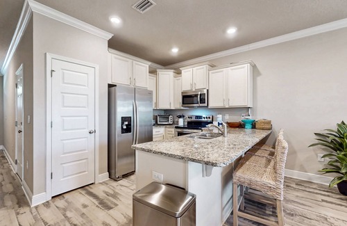 South Pensacola House | Two-story townhome near the beach with WiFi, washer and dryer.