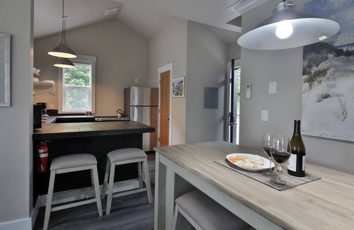 Langley Condo | Two-story townhouse just steps from the waters edge with a private deck. Perfect accommodations for families. Recently remodeled. Beautifully appointed