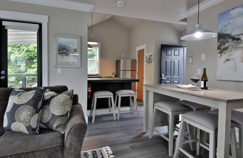 Langley Condo | Two-story townhouse just steps from the waters edge with a private deck. Perfect accommodations for families. Recently remodeled. Beautifully appointed