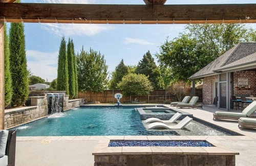 Owasso House | Ultimate Luxury Retreat: House Boasts Hot Tub, Pool, and Easy Airport Access