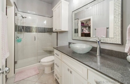Owasso House | Ultimate Luxury Retreat: House Boasts Hot Tub, Pool, and Easy Airport Access