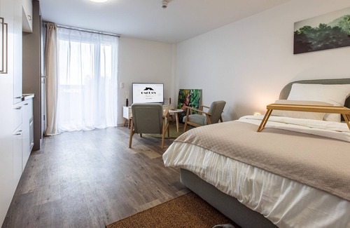 Ostend Apartment | Umquam Frankfurt l Modern Studio and good located King Bed Balcony