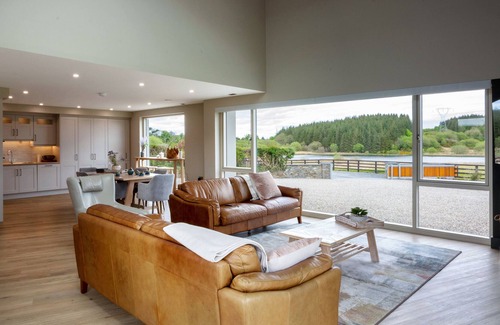 Darragh House | Unique and private home with on-site lake for fishing .