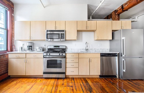 South End House | Unique South End Loft w/Pool, Art Gallery, Steps to T by Blueground