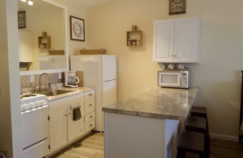 North Truro Condo | Unit #22 - 2nd Floor Deluxe Efficiency, Private Deck with distant Bay Views