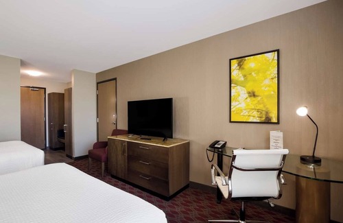 Calgary Hotel | Unwind with Ease: 2 Convenient Rooms, Indoor Swimming Pool, and Free Shuttle