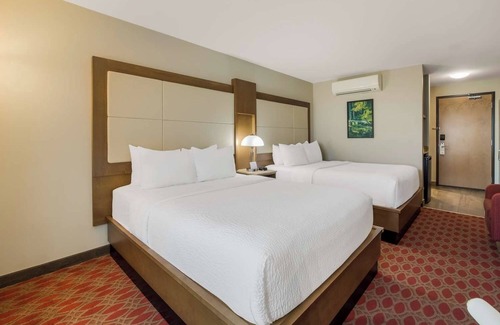 Calgary Hotel | Unwind with Ease: 2 Convenient Rooms, Indoor Swimming Pool, and Free Shuttle