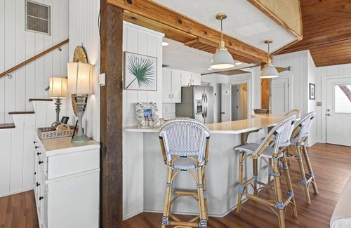 Alligator Point House | Updated Alligator Point bay front home with dock. Great water and sunset views!