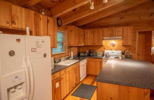 Fleetwood House | Updated Cabin with 2 primary suites, hot tub, spacious covered porch