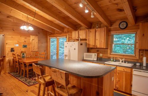 Fleetwood House | Updated Cabin with 2 primary suites, hot tub, spacious covered porch