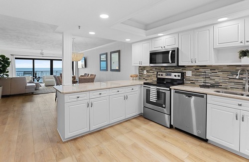 New Smyrna Beach Condo | Updated direct oceanfront condo with spacious balcony, heated pool and beach access