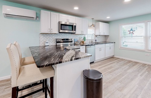 Montego Bay House | Updated dog-friendly home with gas grill, 2 pools, 2 tennis courts, fishing pier