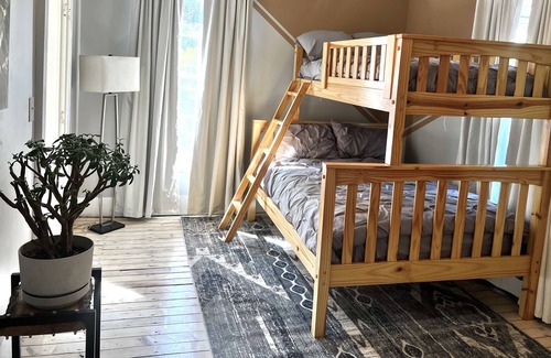 West Camp Apartment | Updated, Eclectic, and Close By!